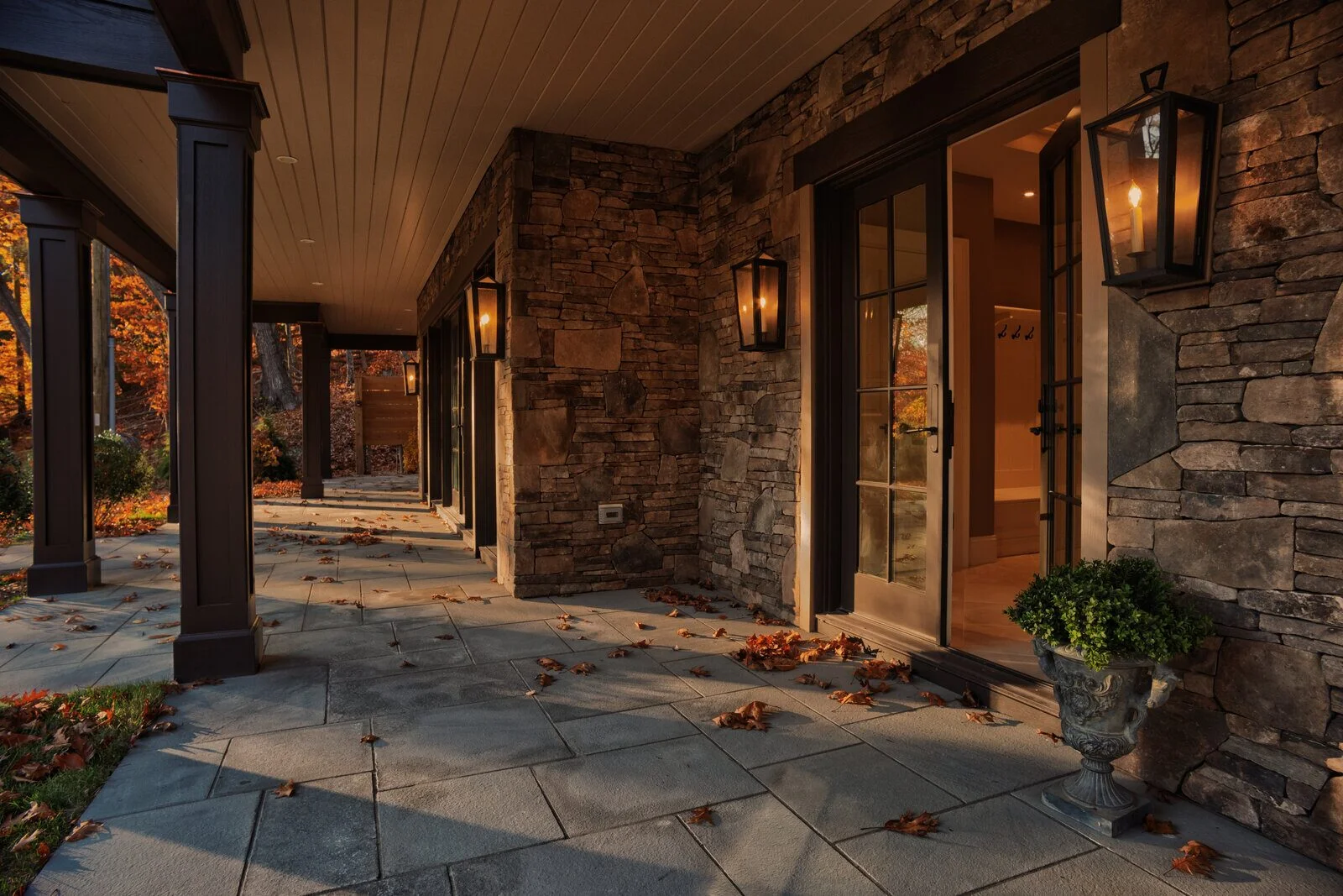 The Lakehouse — covered stone porch